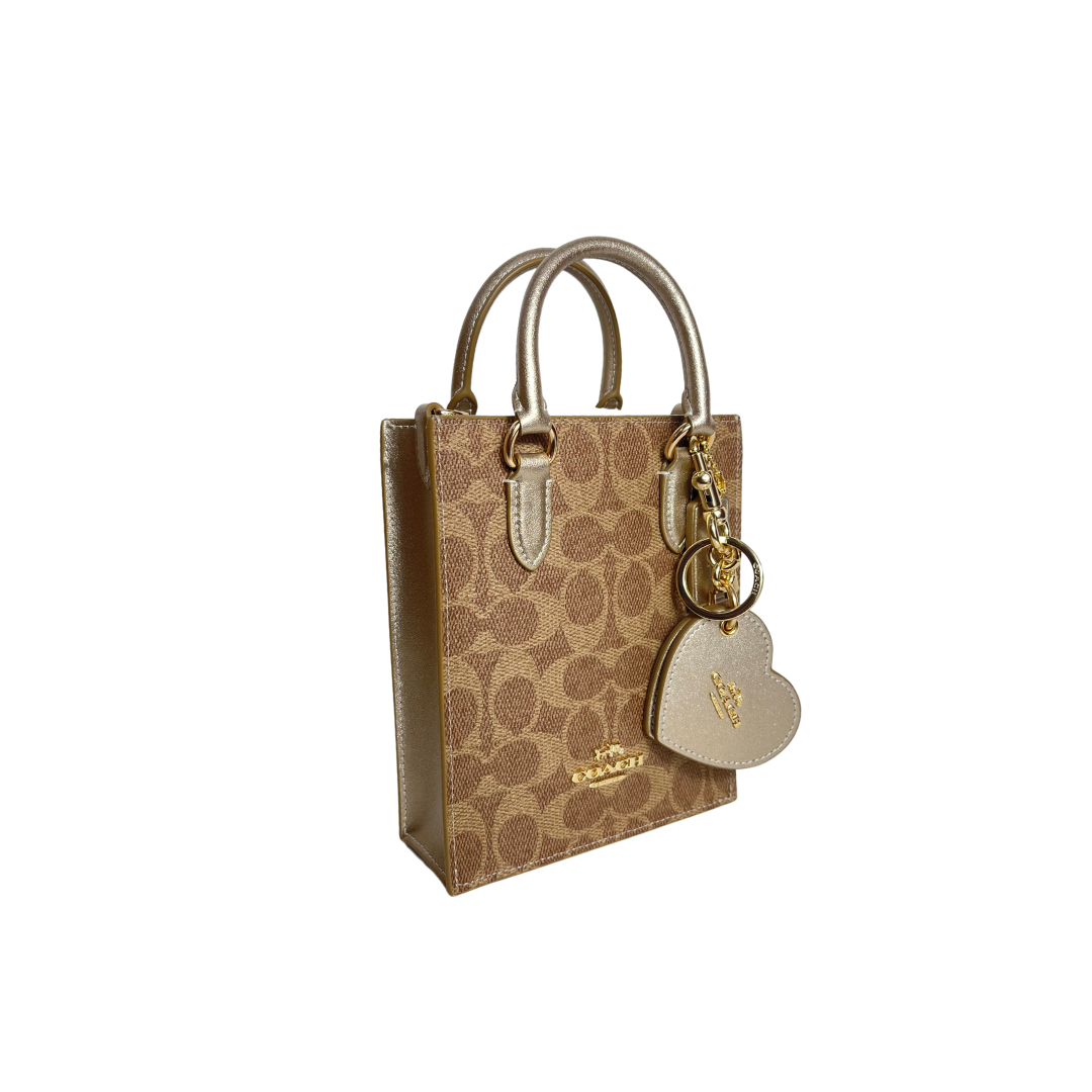 Bolso coach con espejo.